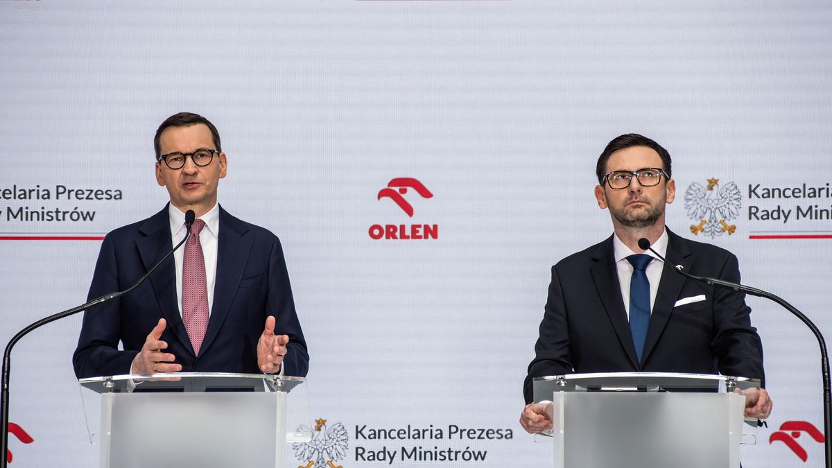 WARSAW, POLAND - 2023/04/17: Prime Minister Mateusz Morawiecki (L) and Daniel Obajtek (R), the President and CEO of the Polish Oil Company ORLEN speak at the press conference in Warsaw. Daniel Obajtek, the President and CEO of the Polish Oil Company ORLEN, announced the details of the planned investments in Small Modular Reactors (SMR) for Poland. For this purpose, the company Orlen Synthos Green Energy (OSGE) was established, supported by the Polish billionaire - Michal Solowow. OSGE will buy reactors from US-based GE Hitachi. (Photo by Attila Husejnow/SOPA Images/LightRocket via Getty Images)
