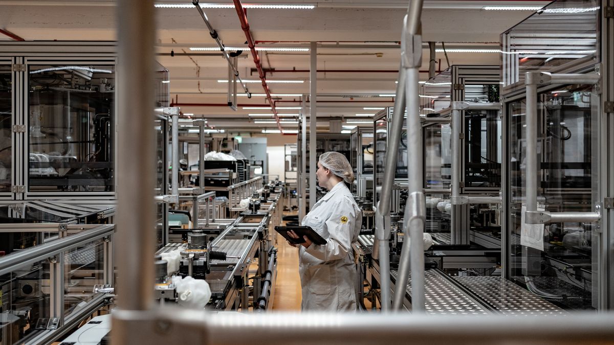 An employee on the production line of the MK C2 brake system module at the Continental AG manufacturing plant in Frankfurt, Germany, on Friday, March 3, 2022. The German auto supplier is scheduled to announce full year earnings on March 8. Photographer: Ben Kilb/Bloomberg via Getty Images