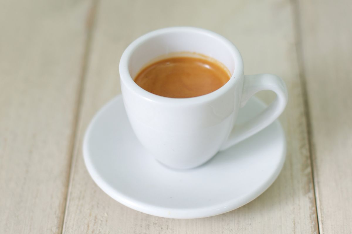 Why is water served with espresso?