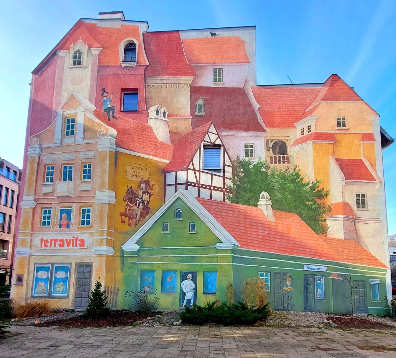 Mural pt. "Opowieść śródecka z trębaczem na dachu i kotem w tle"