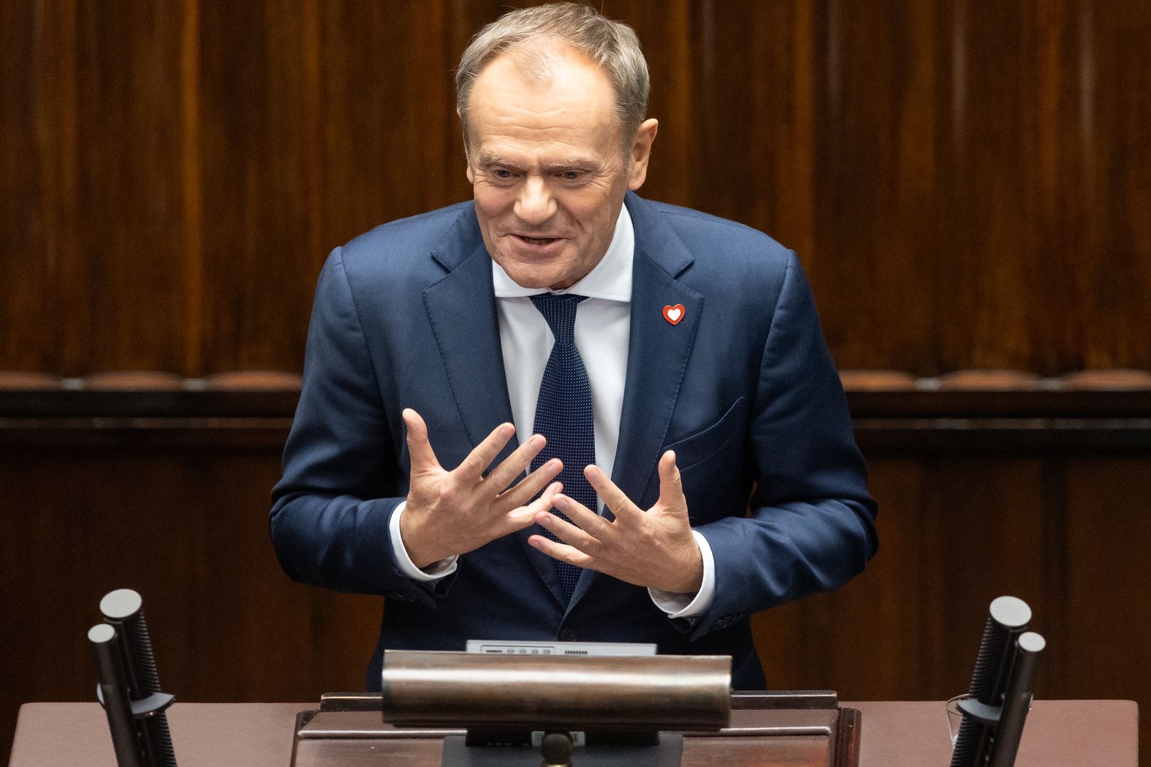 Donald Tusk is participating in the parliamentary debate on the appointment of his government in Warsaw, Poland, on December 12, 2023. (Photo by Foto Olimpik/NurPhoto via Getty Images)
