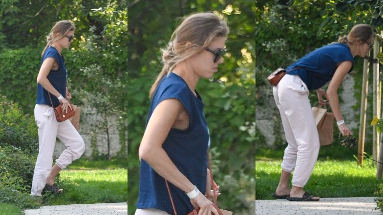 Joanna Opozda i Antek Królikowski na mieście z psem