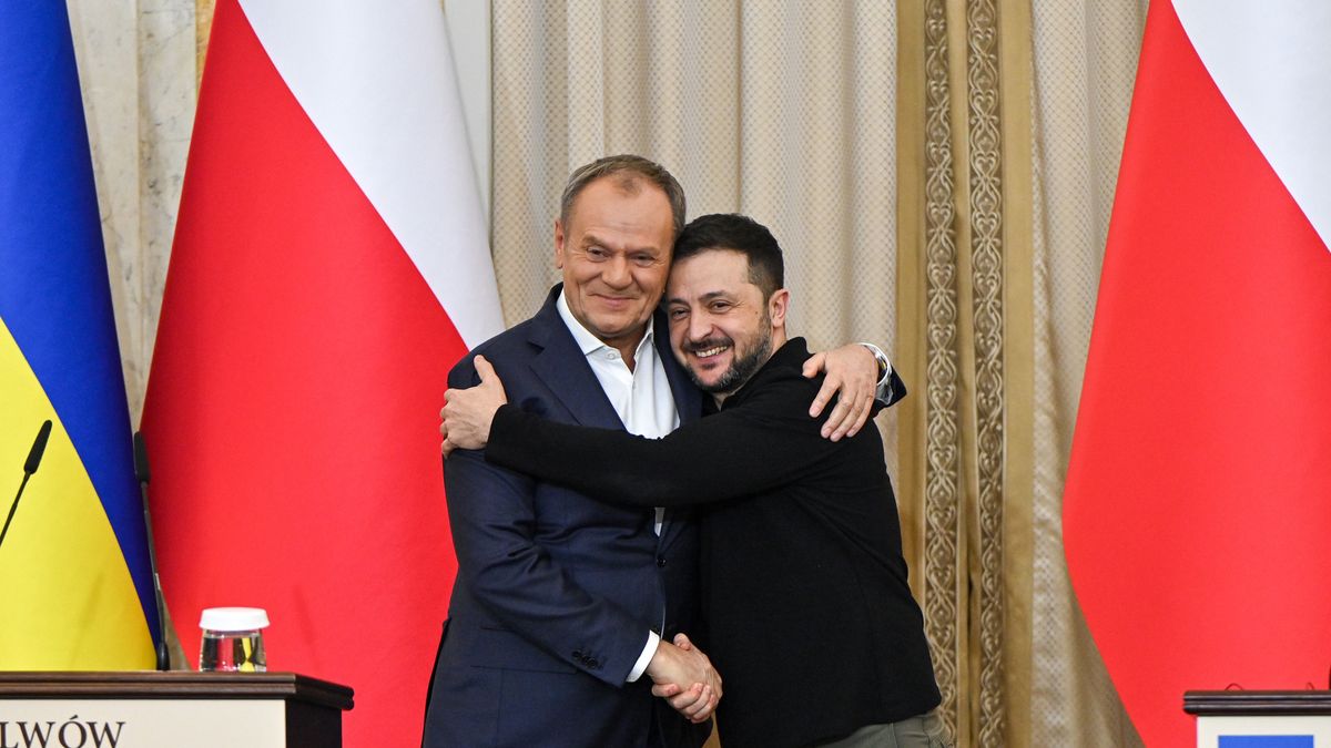 President of Ukraine Volodymyr Zelenskyy and Polish Prime Minister Donald Tusk hug as they pose for a photo at the end of a joint press conference at the Potocki Palace in Lviv, Ukraine, on December 17, 2024. NO USE RUSSIA. NO USE BELARUS. (Photo by Ukrinform/NurPhoto via Getty Images)