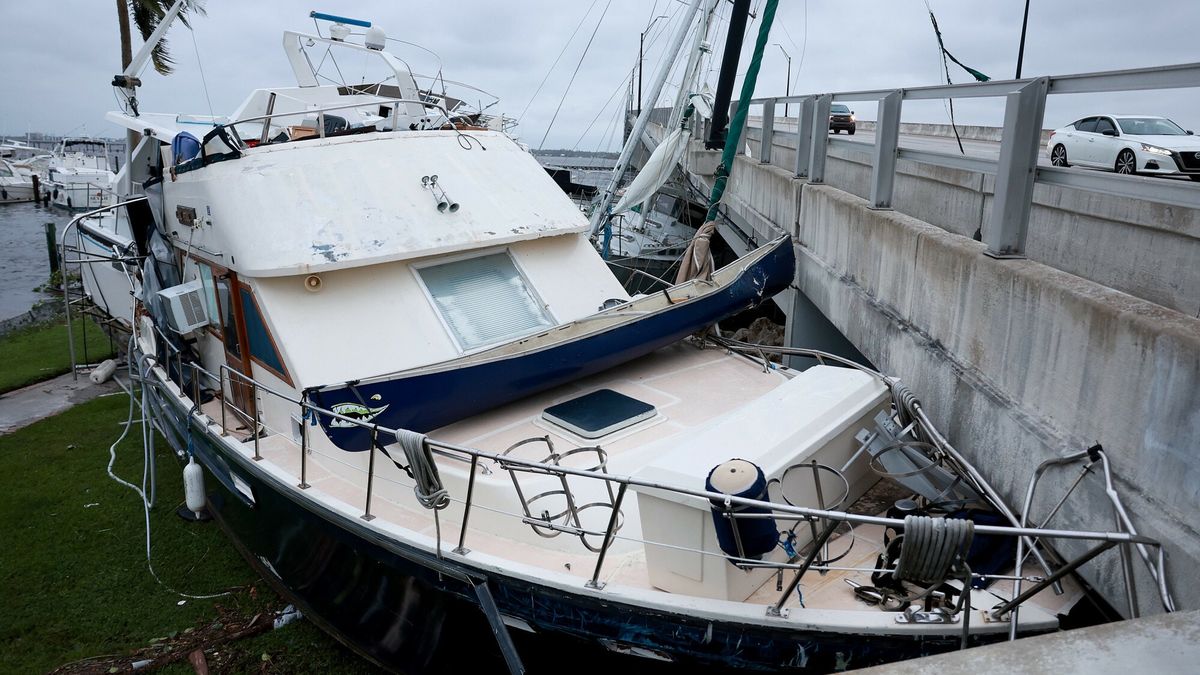Temporary
FORT MYERS FLORIDA - SEPTEMBER 29: Boats are pushed up on a causeway after Hurricane Ian passed through the area on September 29, 2022 in Fort Myers, Florida. The hurricane brought high winds, storm surge and rain to the area causing severe damage.   Joe Raedle/Getty Images/AFP
JOE RAEDLE