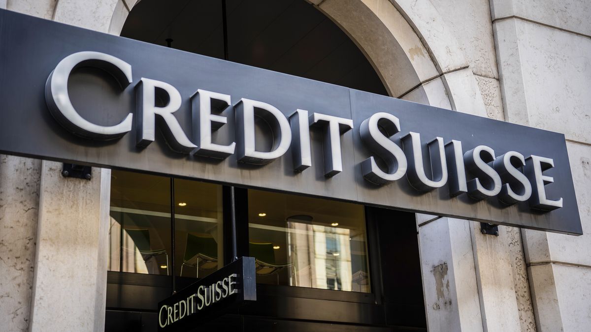 A sign above the entrance to a Credit Suisse Group AG bank branch in Geneva, Switzerland, on Monday, July 25, 2022. Credit Suisse report 2Q earnings on July 27. Photographer: Jose Cendon/Bloomberg via Getty Images