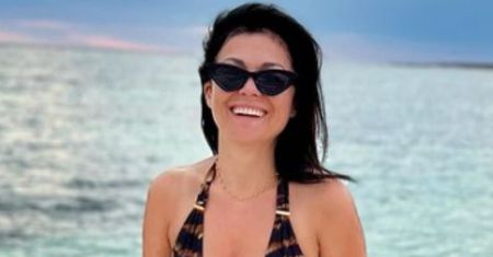 Katarzyna Cichopek pozuje w panterkowym kostiumie na omańskiej plaży. Tygrysica? (ZDJĘCIA)