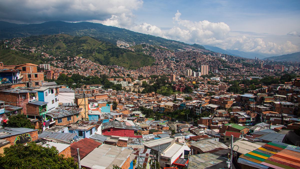 MEDELLIN, COLOMBIA - NOVEMBER 29: General view of Commune 13 of Medellin, Colombia on November 29, 2019. Medellin is experiencing an increase in its national and foreign visitors at the beginning of the Christmas season, through musical expressions, crafts, food and the neighborhood. Commune 13, previously was one of Colombias most dangerous neighborhoods, as it was a constant battleground between gangs, narcos, paramilitaries and the government. (Photo by Gustavo Adolfo Delvasto Daza/Anadolu Agency via Getty Images)