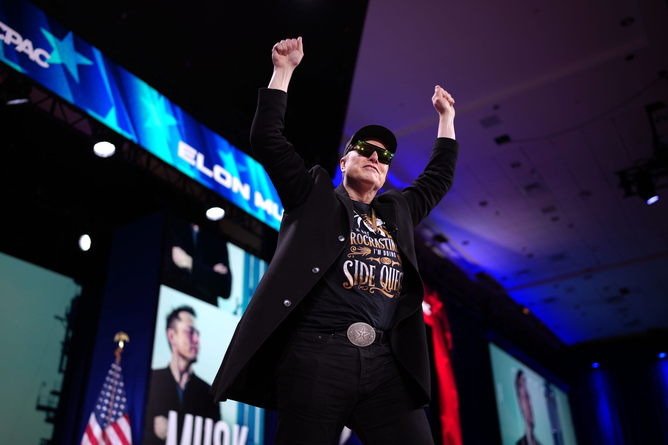 OXON HILL, MARYLAND - FEBRUARY 20: CEO of Tesla and SpaceX Elon Musk arrives on stage at the Conservative Political Action Conference (CPAC) at the Gaylord National Resort Hotel And Convention Center on February 20, 2025 in Oxon Hill, Maryland. The annual four-day gathering brings together conservative U.S. lawmakers, international leaders, media personalities and businessmen to discuss and champion conservative ideas. (Photo by Andrew Harnik/Getty Images)