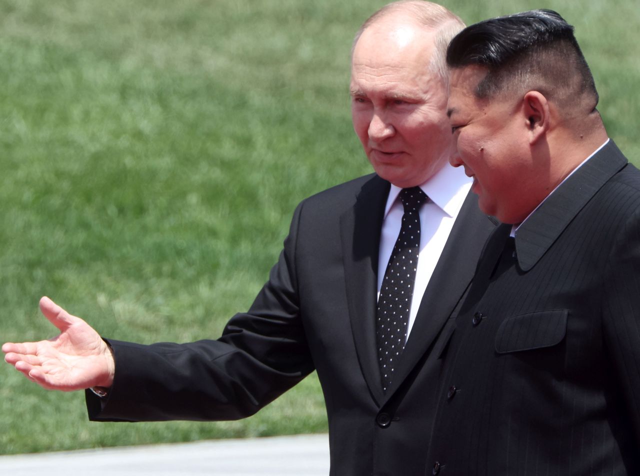 Vladimir Putin and Kim Jong Un