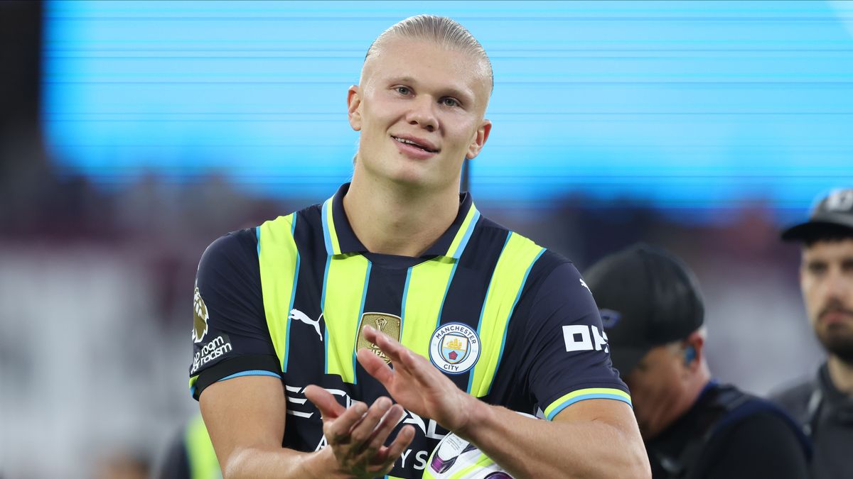 LONDON, ENGLAND - AUGUST 31: Erling Haaland of Manchester City celebrates with hat trick match ball after the Premier League match between West Ham United FC and Manchester City FC at London Stadium on August 31, 2024 in London, England. (Photo by Neal Simpson/Sportsphoto/Allstar via Getty Images)