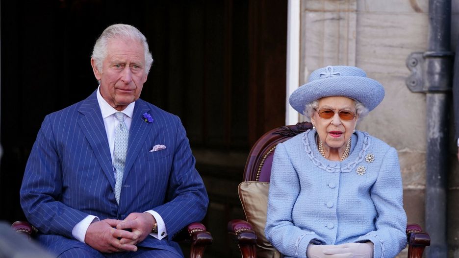 Temporary
(FILES) In this file photo taken on June 30, 2022 Britain's Prince Charles, Prince of Wales, known as the Duke of Rothesay when in Scotland and Britain's Queen Elizabeth II attend the Queen's Body Guard for Scotland (also known as the Royal Company of Archers) Reddendo Parade in the gardens of the Palace of Holyroodhouse in Edinburgh. - Queen Elizabeth II, the longest-serving monarch in British history and an icon instantly recognisable to billions of people around the world, has died aged 96, Buckingham Palace said on September 8, 2022.  Her eldest son, Charles, 73, succeeds as king immediately, according to centuries of protocol, beginning a new, less certain chapter for the royal family after the queen's record-breaking 70-year reign. (Photo by Jane Barlow / POOL / AFP)
JANE BARLOW