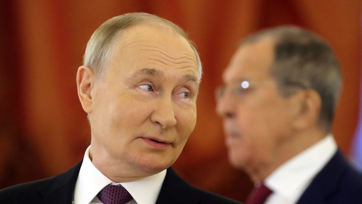 MOSCOW, RUSSIA - NOVEMBER 5:  (RUSSIA OUT) Russian President Vladimir Putin (L) smiles and Foreign Minister Sergey Lavrov (R) looks on during a reception for foreign ambasaadors at the Grand Kremlin Palace, November 5 2024, in Moscow, Russia. Putin received credentials from new 28 foreign ambassadors during a ceremony at the Kremlin. (Photo by Contributor/Getty Images)