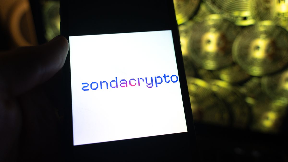 Zondacrypto: Access Issues And Withdrawal Problems
The Zondacrypto logo is displayed on a smartphone screen with a Bitcoin image in the background. (Photo by Marek Antoni Iwanczuk/NurPhoto via Getty Images)
NurPhoto
smartphone, digital assets, image, zondacrypto, screen, background, cryptocurrency exchange, nurphoto