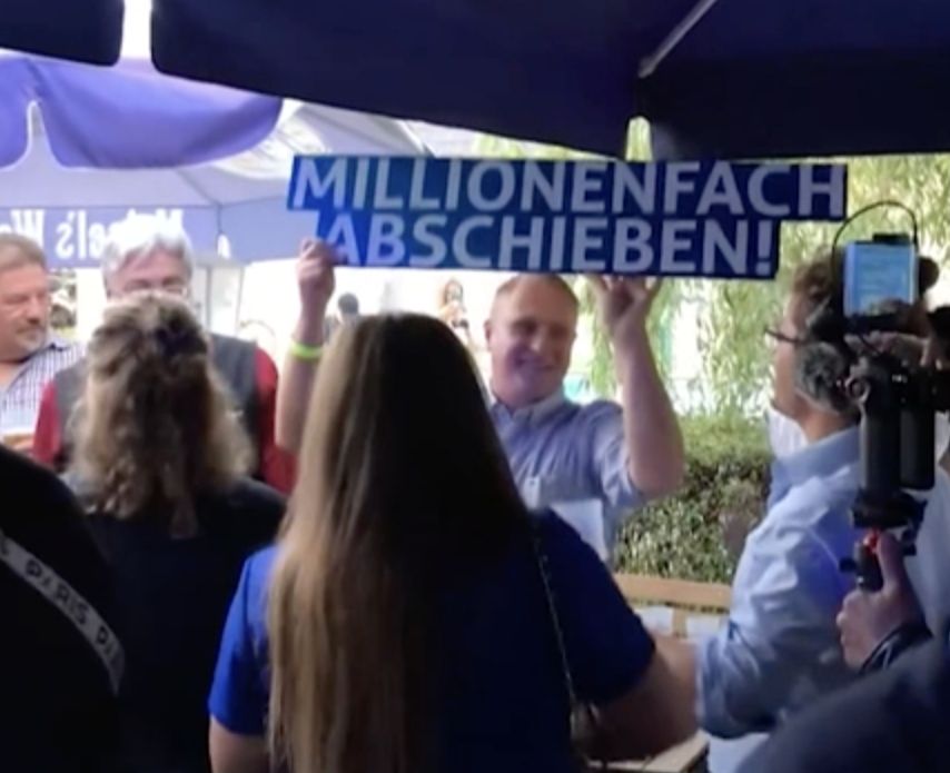 Participants of a post-election meeting of the youth wing of the far-right party Alternative for Germany (AfD) are singing a song about deporting millions of foreigners.