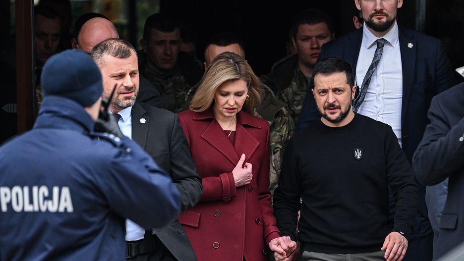 WARSAW, POLAND - APRIL 05: Ukraine’s President, Volodymyr Zelenskyy and First Lady of Ukraine Olena Zelenska exit Bristol Hotel as they move towards the Presidential Palace  on April 05, 2023 in Warsaw, Poland. The Ukrainian President will meet his Polish counterpart, Andrzej Duda and Poland's Prime Minister, Mateusz Morawiecki to discuss issues related to security, economic and agricultural cooperation. (Photo by Omar Marques/Getty Images)