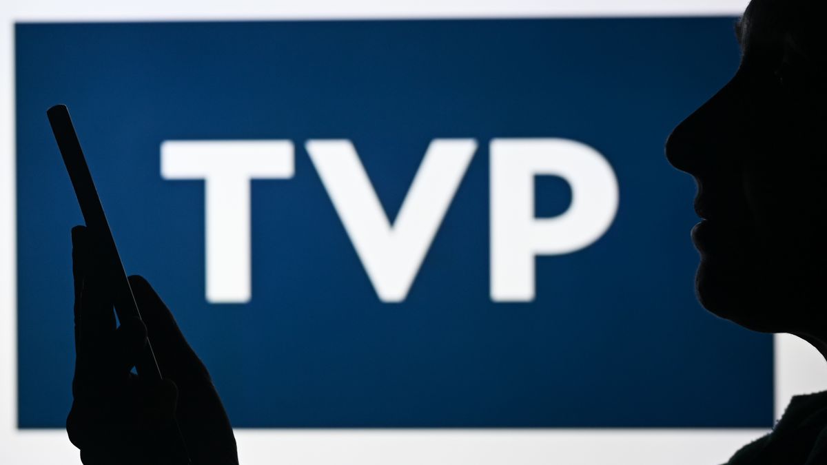 EDMONTON, CANADA - APRIL 28:
An image of a woman holding a cell phone in front of the TVP - Telewizja Polska media company logo displayed on a computer screen, on April 29, 2024, in Edmonton, Canada. (Photo by Artur Widak/NurPhoto via Getty Images)
