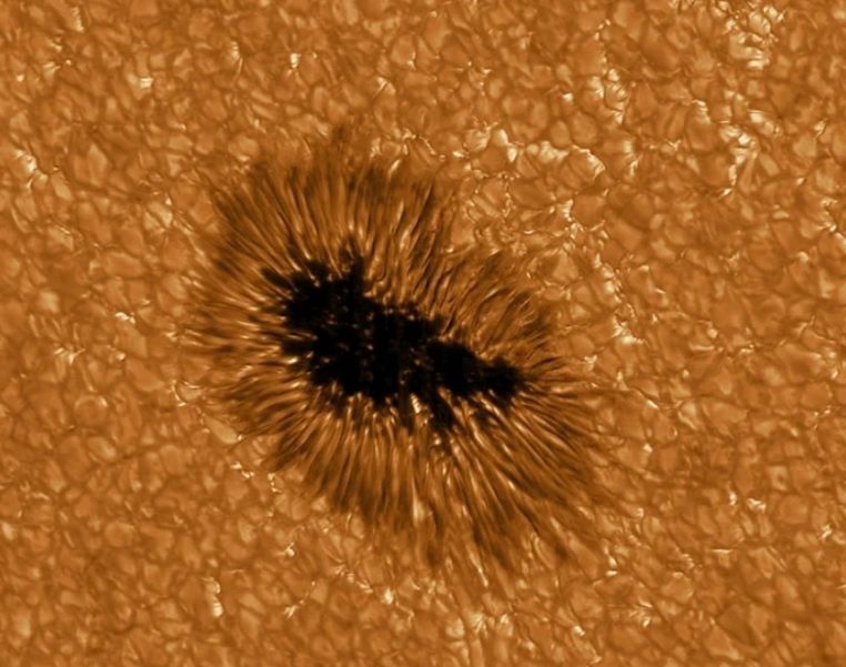 Giant sunspot 15 times Earth's width unleashes solar fury