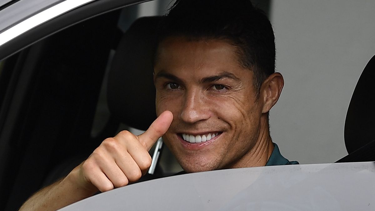 TURIN, ITALY - MAY 19: Juventus' Portuguese forward Cristiano Ronaldo exit in his car after to resume training after a quarantine on May 19, 2020 at the club's Continassa training ground in Turin, as the country's lockdown is easing after over two months, aimed at curbing the spread of the COVID-19 infection, caused by the novel coronavirus. during the   Cristiano Ronaldo arrival at the Turin on May 19, 2020 in Turin Italy (Photo by Mattia Ozbot/Soccrates/Getty Images)