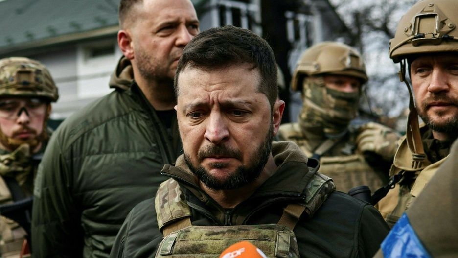 100 dni wojny na Ukrainie - AFP
UKRAINE - RUSSIA CONFLICT 100 DAYS 100 PICTURES
AFP presents a selection of 100 pictures to mark 100 days of Russia's war in Ukraine

Ukainian President Volodymyr Zelensky (C) speaks to the press in the town of Bucha, northwest of the Ukrainian capital Kyiv, on April 4, 2022. - Ukraine's President Volodymyr Zelensky said on April 3, 2022 the Russian leadership was responsible for civilian killings in Bucha, outside Kyiv, where bodies were found lying in the street after the town was retaken by the Ukrainian army. (Photo by RONALDO SCHEMIDT / AFP) / UKRAINE - RUSSIA CONFLICT 100 DAYS 100 PICTURES
RONALDO SCHEMIDT