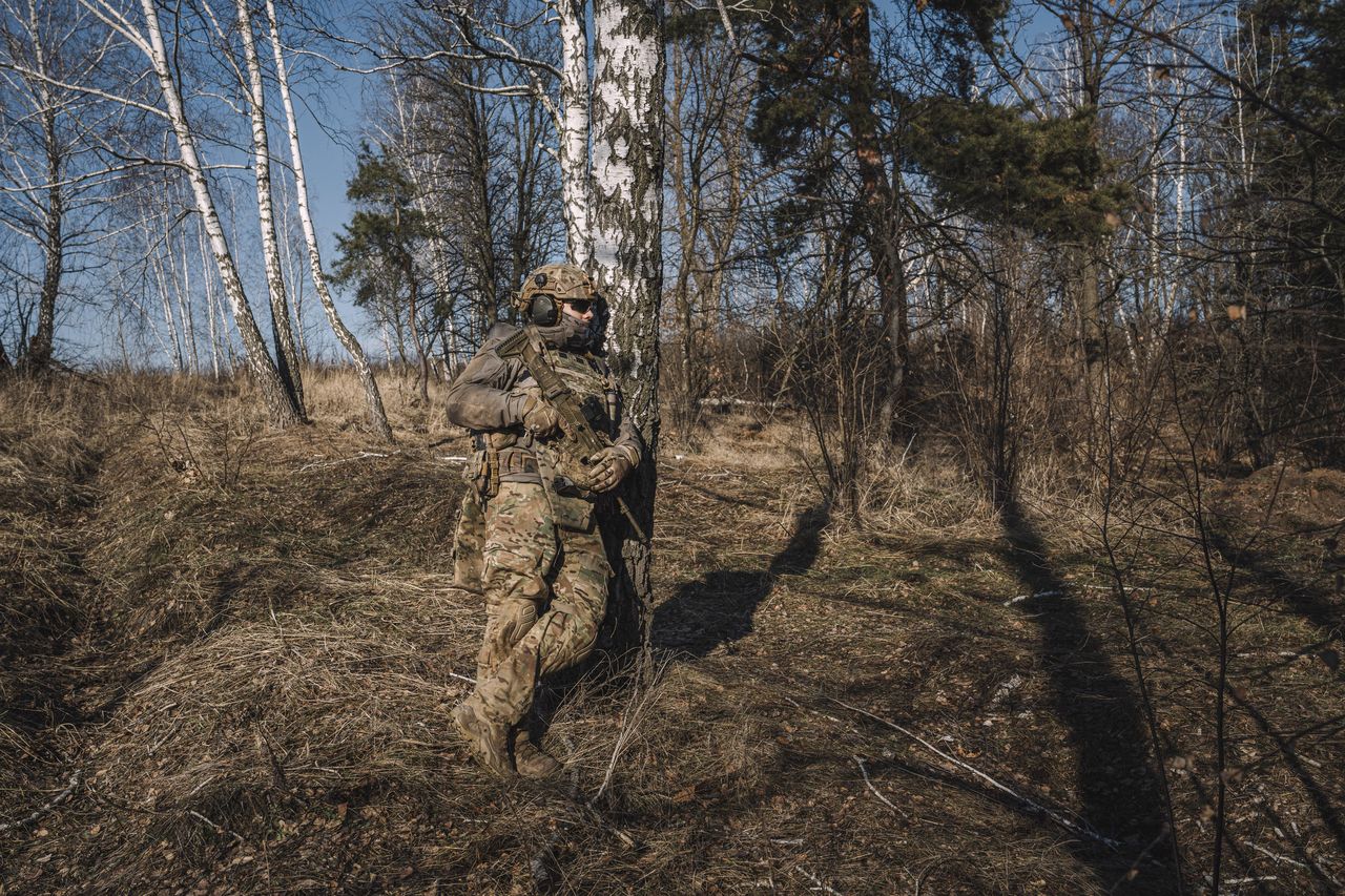 A member of the 'Paragon' military division, part of the 'Tymur' military intelligence unit of the Armed Forces of Ukraine, during training for an enemy observation post assault at an undisclosed location in Ukraine, on Monday, Jan. 29, 2024. The European Union is considering options to address demands for tighter controls over a proposed 50 billion ($54.1 billion) aid package for Ukraine as leaders aim to head off another veto of the package by Hungary. Photographer: Andrew Kravchenko/Bloomberg via Getty Images
