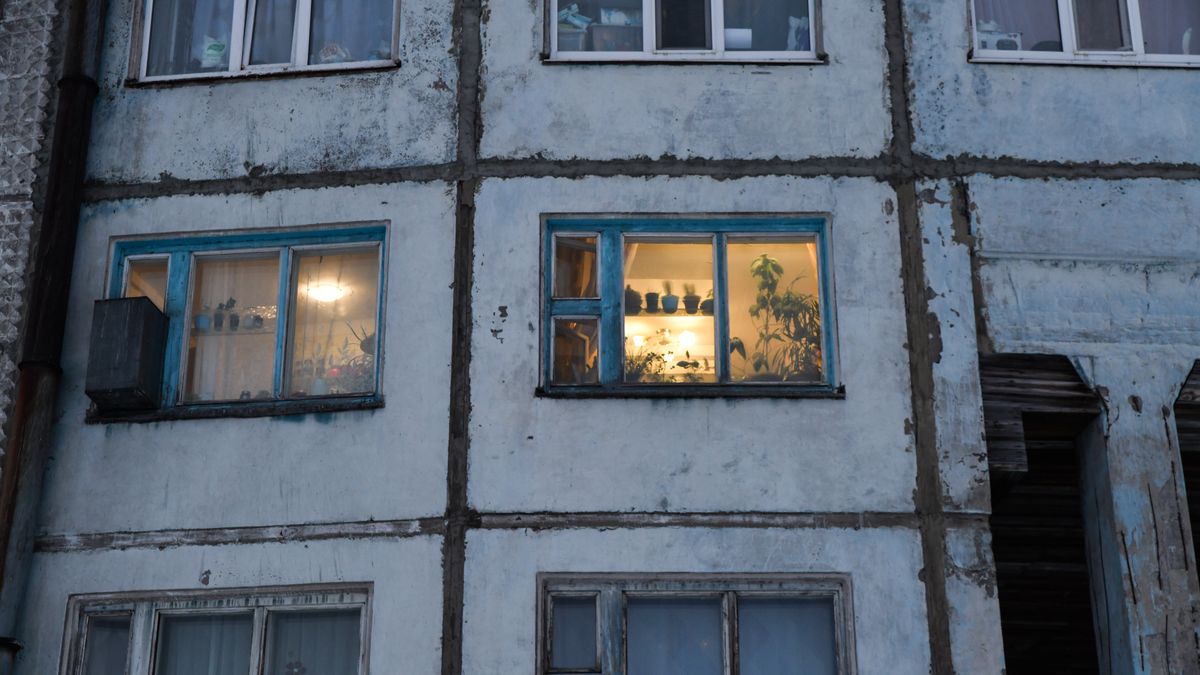 VORKUTA, RUSSIA - MARCH 08: Colorful windows are seen amidst the harsh and polar climate during tundra as resident prefer to ultraviolet lamps to help plants survive in low light conditions in Vorkuta, Russia on March 08, 2024. Vorkuta's history traces back to the construction of its inaugural mine in the early 1930s, undertaken by prisoners of Vorkutlag. In 1943, the city was officially granted its status, leading to development expanding to the opposite side of the river, with Rudnik emerging as one of its neighborhoods. As of the late 1980s, Rudnik had begun experiencing abandonment, and by the early 2000s, it was fully closed down. Residents were relocated to apartments in Vorkuta during this period. (Photo by Alexander Manzyuk/Anadolu via Getty Images)