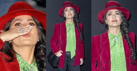 Wystrojona Salma Hayek pozdrawia fotografów na paryskim pokazie