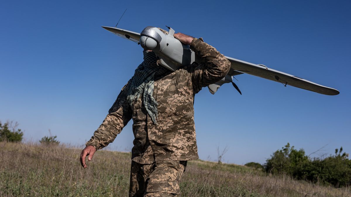 DONETSK OBLAST, UKRAINE - 10 MAY: A Ukrainian air intelligence soldier carries a drone in the direction of Bakhmut, Ukraine, on May 10, 2024. (Photo by Diego Herrera Carcedo/Anadolu via Getty Images)