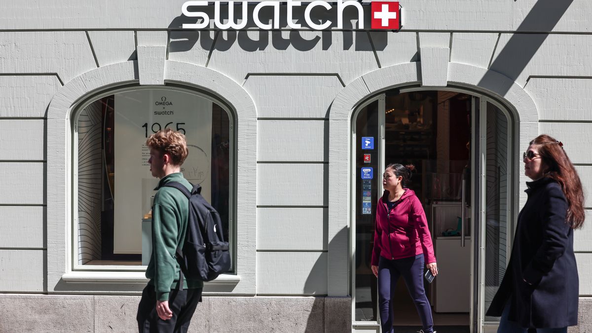 BASEL, SWITZERLAND - APRIL 11: People walk in front of the Swatch store on April 11, 2025 in Basel, Switzerland. Before US President Donald Trump postponed a range of imminent tariffs, Switzerland was facing a daunting 31% levy on most Swiss goods to imported to the United States, a higher rate than would have been imposed on European Union countries. Such a tariff would've been high damaging to iconic Swiss industries like chocolate and watchmaking. The reprieve will provide breathing room for Swiss officials looking to negotiate a deal with the US, although Swiss goods will still face a 10% tariff in the meantime, and the fate of a potential separate tariff on pharmaceuticals is unknown. (Photo by Sedat Suna/Getty Images)