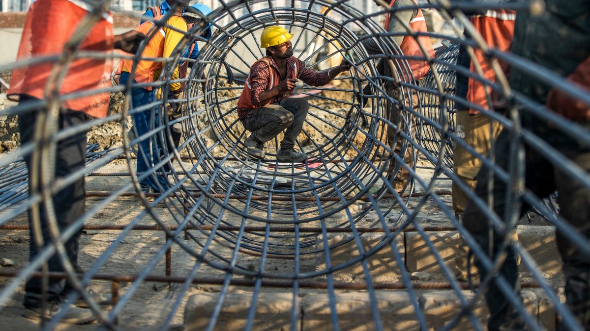 Workers build the foundation at the construction site of Dixon Technologies Ltd.'s new factory, in Noida, India, on Friday, March 22, 2024. Dixon Technologies Ltd., an Indian contract manufacturer, is benefitting from a boom in new business from clients like Chinese smartphone maker Xiaomi Corp. and South Korea's Samsung Electronics Co. wishing to use its factories to manufacture goods for India's rising middle class. Photographer: Prashanth Vishwanathan/Bloomberg via Getty Images