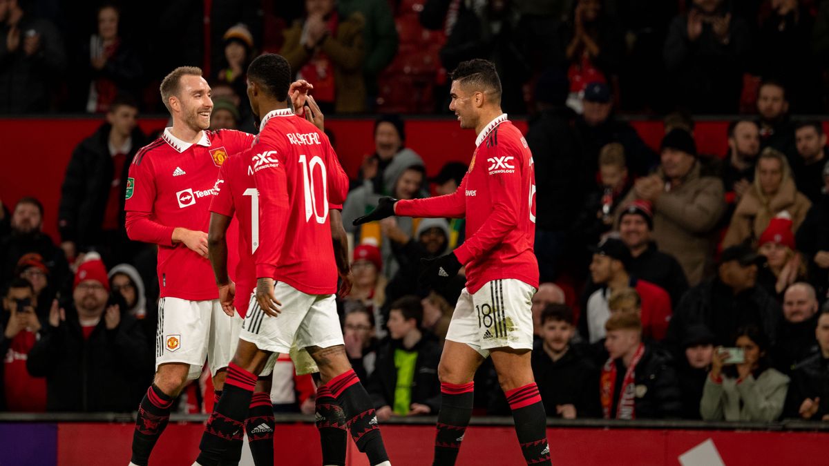 MANCHESTER, ENGLAND - JANUARY 10:  Marcus Rashford of Manchester United celebrates scoring a goal to make the score 3-0 with Christian Eriksen during the Carabao Cup Quarter Final match between Manchester United and Charlton Athletic at Old Trafford on January 10, 2023 in Manchester, England. (Photo by Ash Donelon/Manchester United via Getty Images)