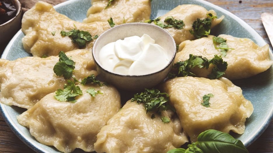 Mashed potato stuffed dumplings with cream