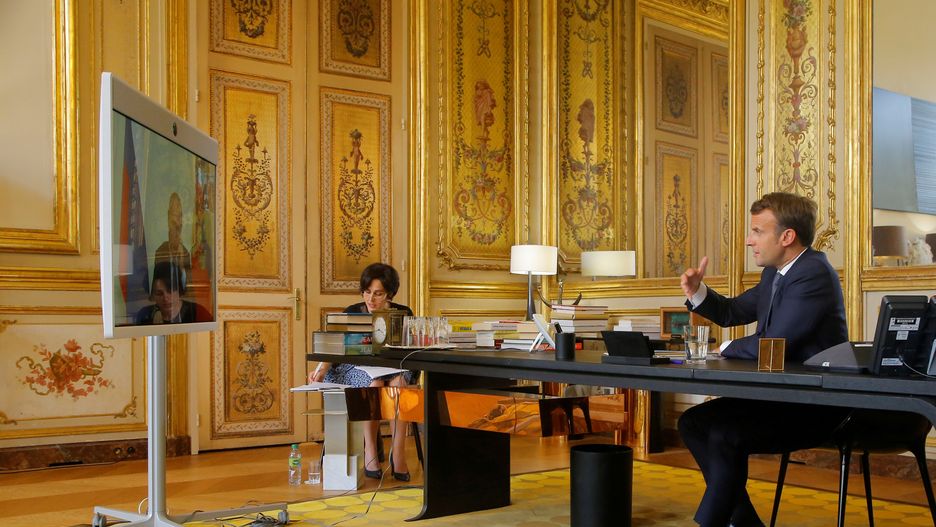 French President Emmanuel Macron talks with Russian President Vladimir Putin during a video conference at the Elysee Palace in Paris, France, June 26, 2020