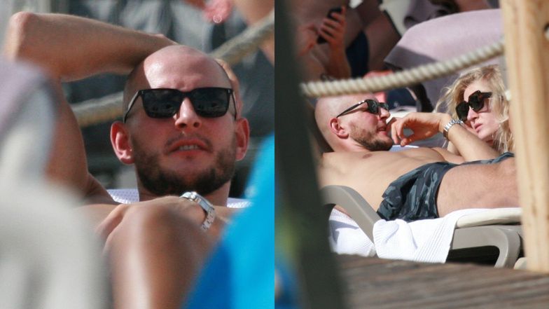 Bartosz Kurek z żoną opalają się w Sopocie