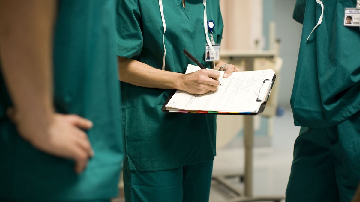 Three surgeons in operating room, mid section
Thomas Northcut
Easy Retouch, USA, California, Hawthorne, horizontal, indoors, day, mid section, differential focus, standing, holding, writing activity, 35-39 years, 40-44 years, 45-49 years, mid adult women, mid adult men, mature men, three people, planning, writing instrument, office supply, cooperation, teamwork, healthcare and medicine, doctor, hospital, operating room, surgical gown, expertise, togetherness, Latin American and Hispanic Ethnicity, Caucasian White, health care, medical procedure, health, medical, African Ethnicity, surgeon, clipboard, scrubs