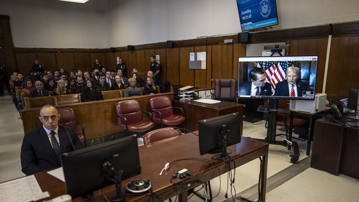 New York, NY - January 10 : Attorney Emil Bove, left, listens as Attorney Todd Blanche and President-elect Donald Trump, seen on a television screen, appear virtually for sentencing after Trump was found guilty on 34 felony counts in his hush money criminal trial last year, at the Manhattan criminal court on Friday, Jan 10, 2025 in New York, NY. (Photo by Jabin Botsford/The Washington Post via Getty Images)
