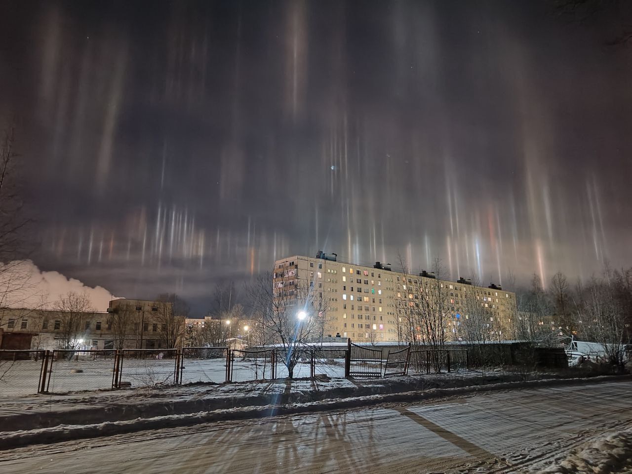 Mysterious light pillars illuminate Russian winter sky
