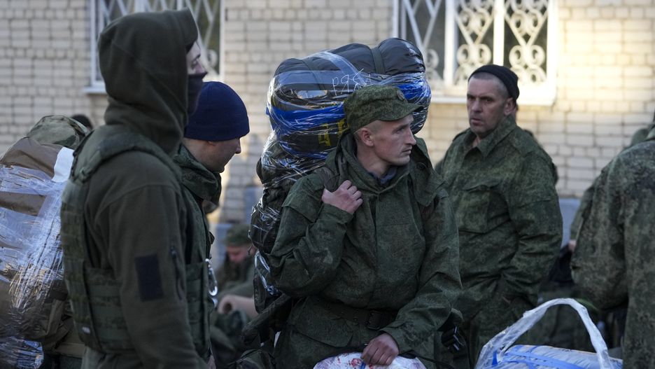 MOSCOW, RUSSIA - OCTOBER 10: Russian citizens drafted during the partial mobilization are seen being dispatched to combat coordination areas after a military call-up for the Russia-Ukraine war in Moscow, Russia on October 10, 2022. (Photo by Stringer/Anadolu Agency via Getty Images)