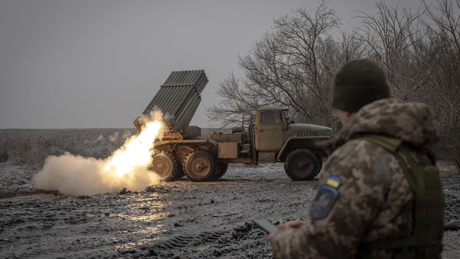 AVDIIVKA, UKRAINE - DECEMBER 16: Soldiers of the artillery battery of the 59th Motorized Brigade of the Ukrainian army fire artillery towards Russian positions to support frontline troops in the direction of Avdiivka, Donetsk Oblast, Ukraine on December 16, 2023. Ukrainian artillery units deployed in the Avdiivka direction, where heavy clashes have been continuing due to the intensification of Russian attacks, continue their intense firing activities. Trying to repel the attacks of Russian troops, the Ukrainian army defends the frontlines by continuing its air and land shooting activities by firing with planes, tanks, helicopters and artillery. (Photo by Ozge Elif Kizil/Anadolu via Getty Images)