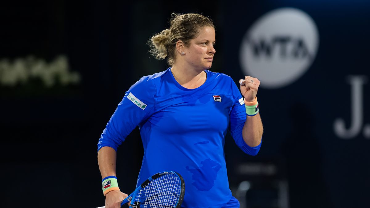 DUBAI, UNITED ARAB EMIRATES - FEBRUARY 17: Kim Clijsters of Belgium in action against Garbine Muguruza of Spain during her first-round match at the 2020 Dubai Duty Free Tennis Championships at the Dubai Duty Free Tennis Stadium on February 17, 2020 in Dubai, United Arab Emirates (Photo by Robert Prange/Getty Images)