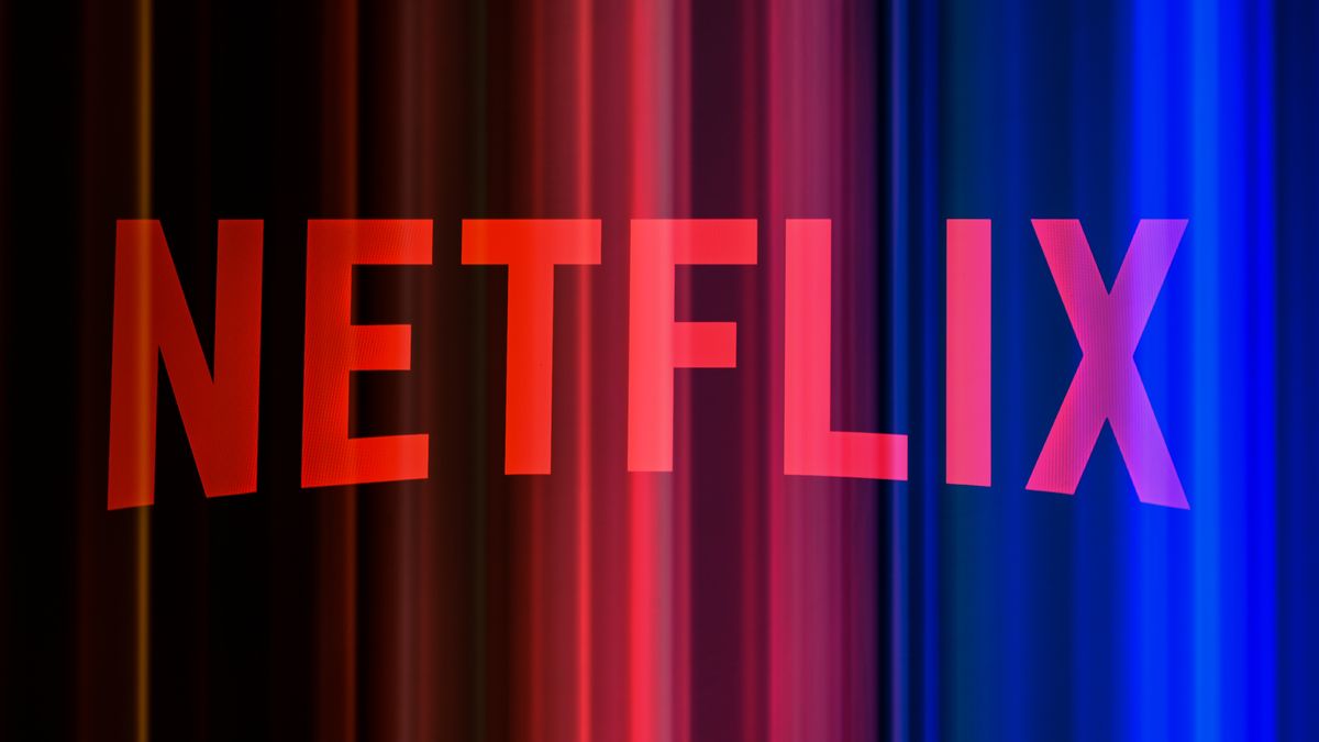 The Netflix logo is photographed using a double exposure with a promotional image featuring a color gradient in the background, in Creteil, France, on July 16, 2026, as Netflix released its financial results for the second quarter of 2026. (Photo by Samuel Boivin/NurPhoto via Getty Images)