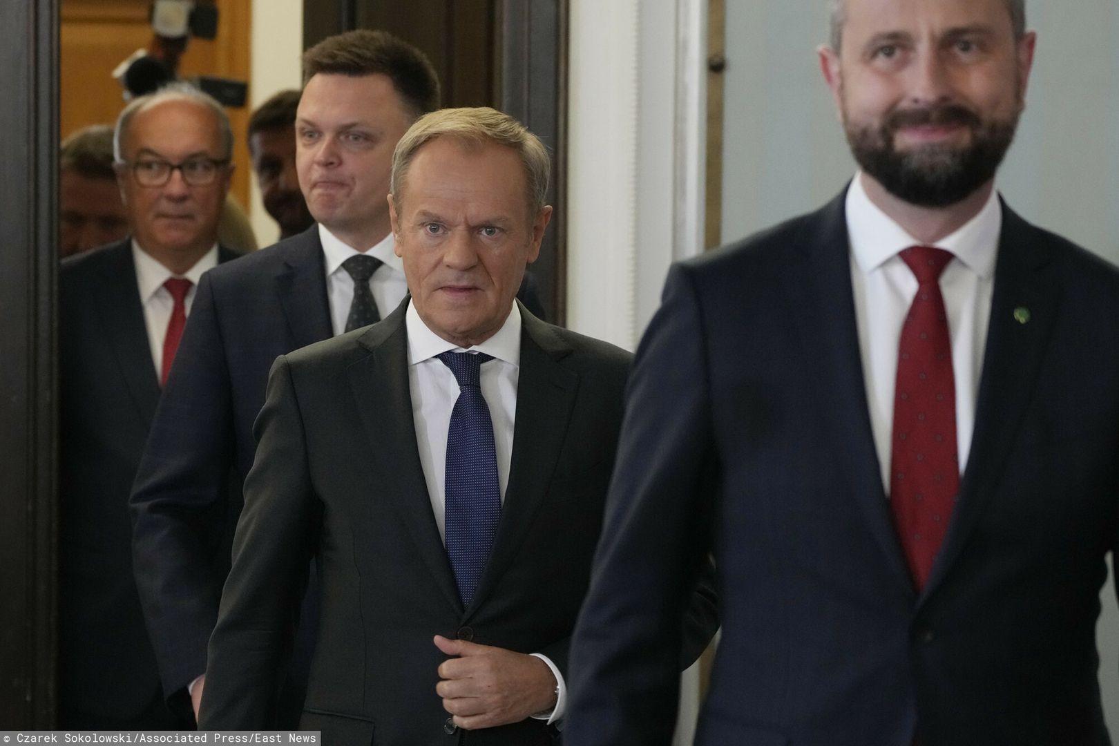 Konsultacje ws. nowego rz?du w Pa?acu Prezydenckim
Opposition party leaders, from left, Wlodzimierz Czarzasty, Szymon Holownia, Donald Tusk and W?adyslaw Kosiniak-Kamysz arrive for a meeting where announce to reporters that Tusk is their candidate for prime minister and that they are ready to govern together, in Warsaw, Poland, on Tuesday Oct. 24, 2023. The parties together won a majority of seats in parliament in an election on Oct. 15. The current conservative nationalist ruling party, Law and Justice, won more votes than any other party but has no coalition partner and no apparent path to keeping power. (AP Photo/Czarek Sokolowski)
Czarek Sokolowski