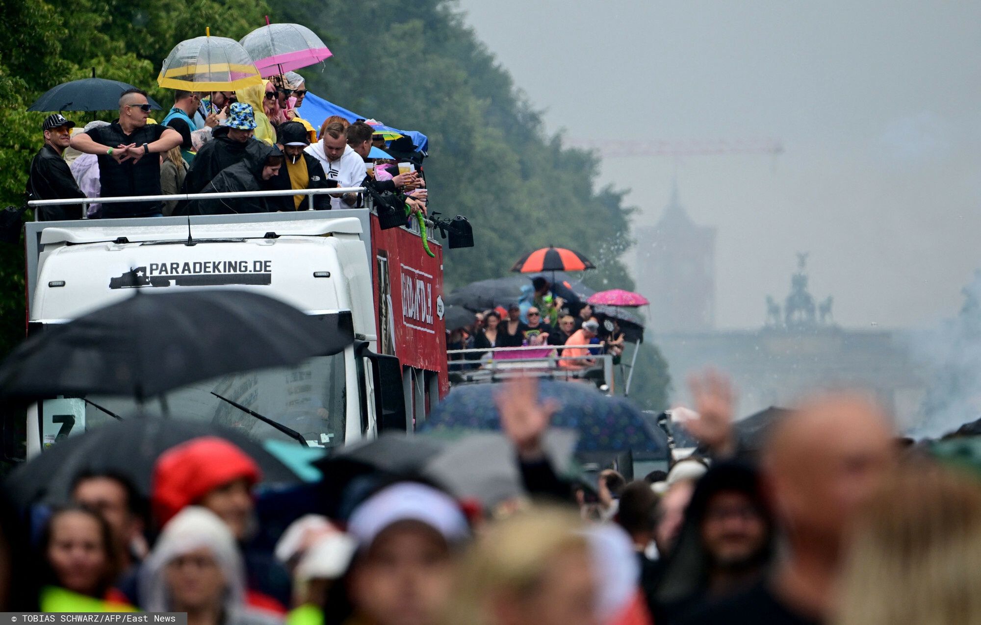 Temporary
Revellers cheer as they attend the "Rave The Planet" electronic music parade titled "Our Future is Now" in Berlin on July 12, 2025 in Berlin. (Photo by Tobias SCHWARZ / AFP)
TOBIAS SCHWARZ