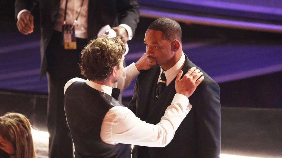 94th Academy Awards - ShowHOLLYWOOD, CA - March 27, 2022.   Bradley Cooper comforts Will Smith  during the show  at the 94th Academy Awards at the Dolby Theatre at Ovation Hollywood on Sunday, March 27, 2022.  (Myung Chun / Los Angeles Times via Getty Images)Myung Chun