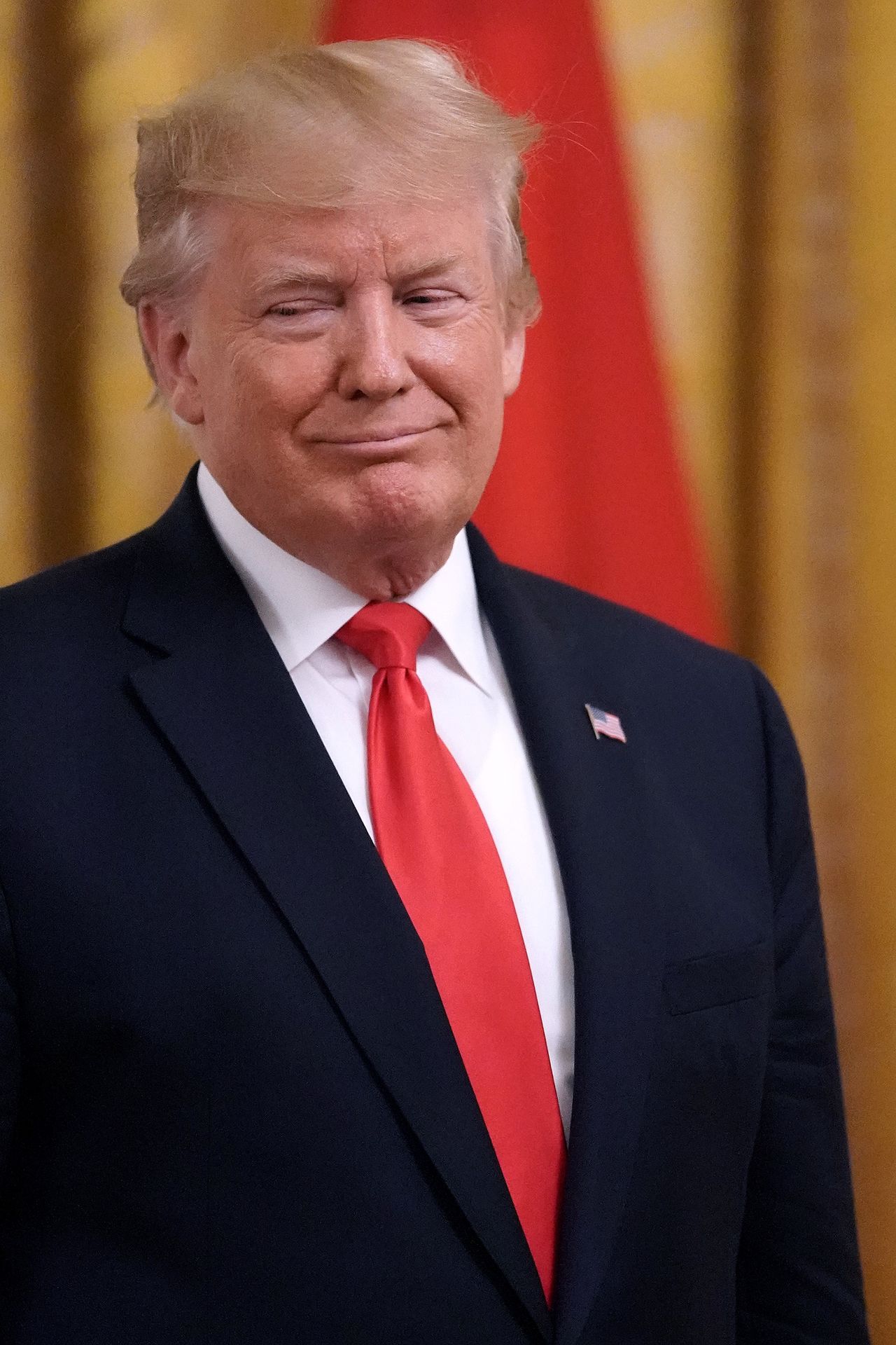 WASHINGTON, DC - JULY 18:  U.S. President Donald Trump delivers remarks during a ceremony where a flag from D-Day was given to the Smithsonian in the East Room of the White House July 18, 2019 in Washington, DC. The American flag, which was flown on the stern of the boat that led the first U.S. troops onto Utah Beach on D-Day, was purchased by Dutch businessman and art collector Bert Kreuk bought the flag for $514,000 at an auction in Dallas in 2016. (Photo by Chip Somodevilla/Getty Images)