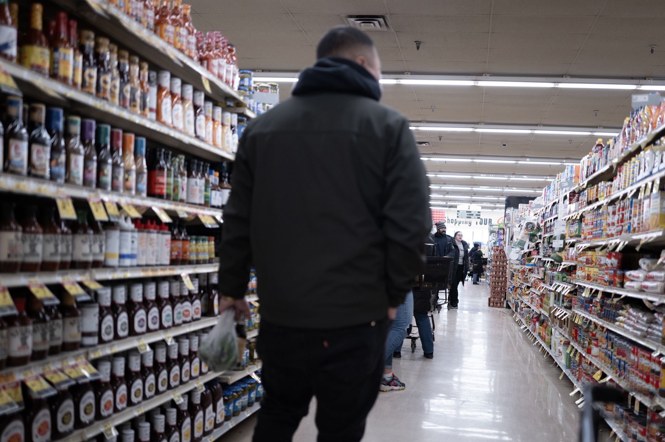 CHICAGO, ILLINOIS - JANUARY 15: Customers shop for food at a grocery store on January 15, 2025 in Chicago, Illinois. Food price rose 2.5 percent in December compared to the previous year, slightly lower than the 2.9 percent increase in overall consumer prices.  (Photo by Scott Olson/Getty Images)