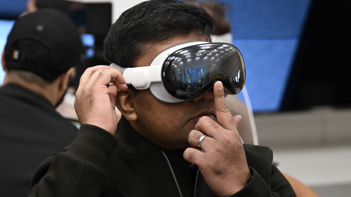 NEW YORK, UNITED STATES - FEBRUARY 03: Customers check Apple Vision Pro mixed reality (XR) headset at Apple store in New York, United States on February 03, 2024. (Photo by Fatih Aktas/Anadolu via Getty Images)