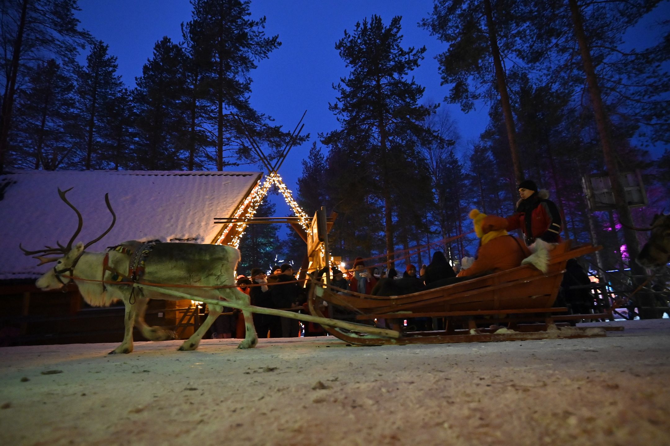 LAPLAND, FINLAND - DECEMBER 31: People spend time at the city center of Rovaniemi, Lapland during the New Year's eve on December 31, 2024 in Finland. (Photo by Alex Nicodim/Anadolu via Getty Images)
