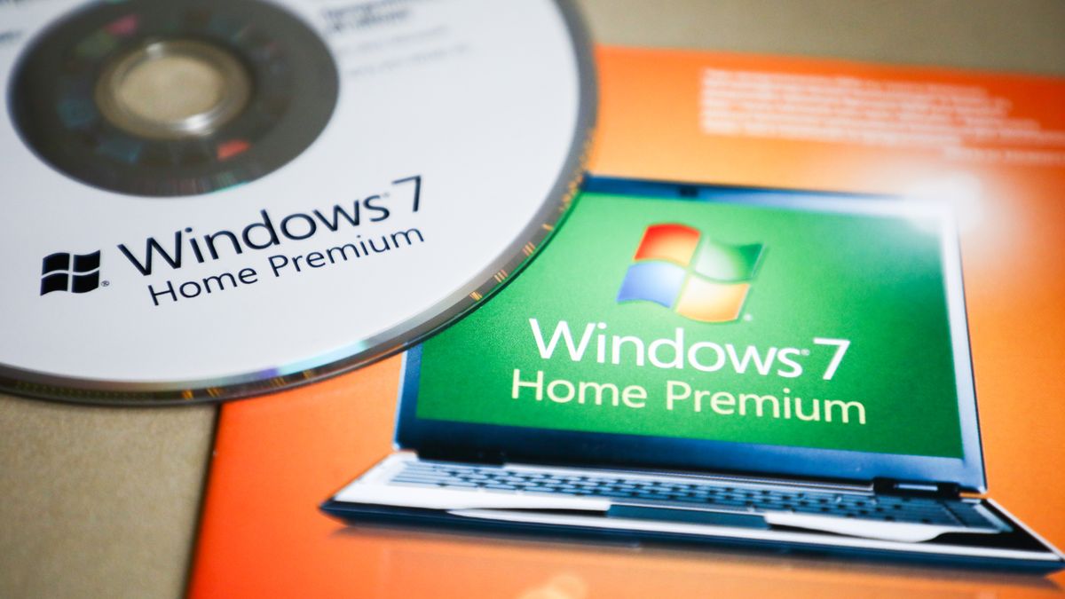 Windows 7 Home Premium operating system disc is pictured in Poland on 22 February, 2020. After 10 years, support for Windows 7 ended on January 14, 2020. Microsoft will no longer provide software updates and support, including security updates. (Photo by Beata Zawrzel/NurPhoto via Getty Images)