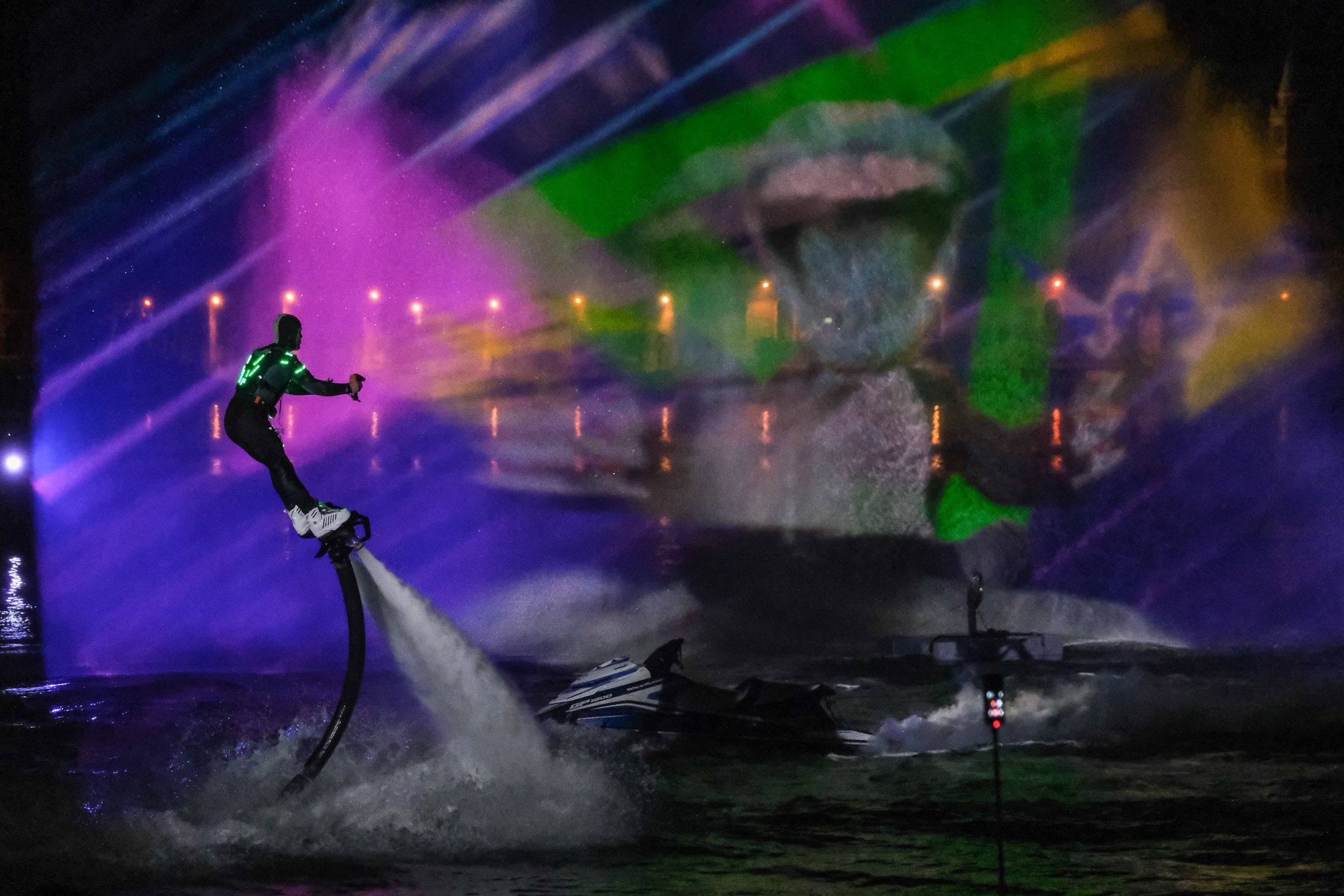 VENICE, ITALY - FEBRUARY 10: Artist performs with jetpack during the "Original Signs" show at the Venice Carnival, organized by VelaSpa, at Arsenale on February 10, 2023 in Venice, Italy. The Venice Carnival 2023, titled "Take Your Time for the Original Signs," began on February 4th and ends on February 21st. (Photo by Stefano Mazzola/Getty Images)