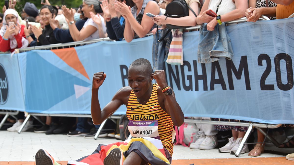 BIRMINGHAM, ENGLAND - JULY 30: Gold Medalist, Victor Kiplangat of Team Uganda celebrates after finishing first in the Men's Marathon on day two of the Birmingham 2022 Commonwealth Games at Smithfield on July 30, 2022 on the Birmingham, England. (Photo by Nathan Stirk/Getty Images)